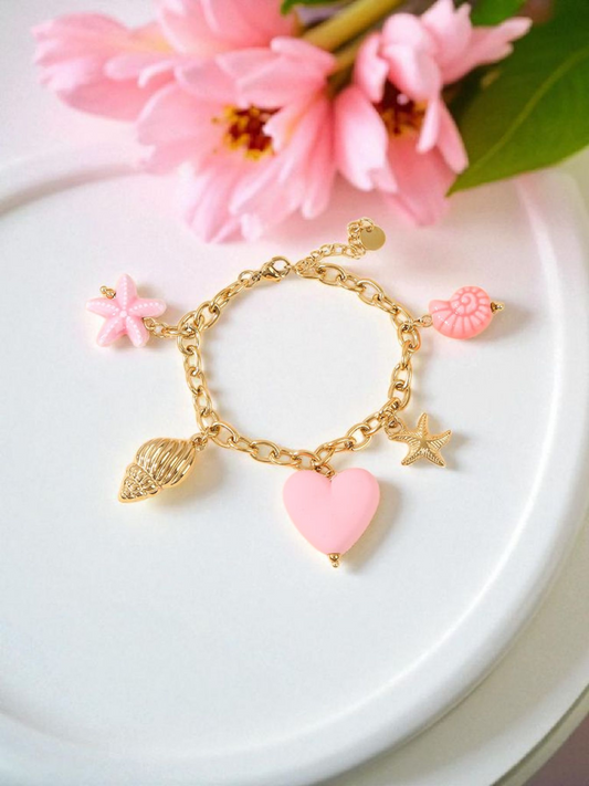 Bracelet doré breloques mer colorée rose