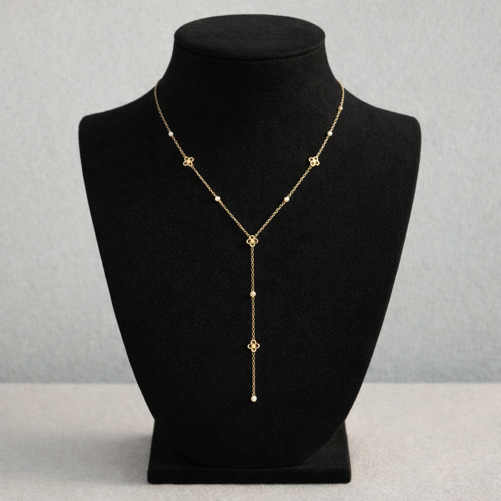 Collier doré en Y orné de petites fleurs et strass