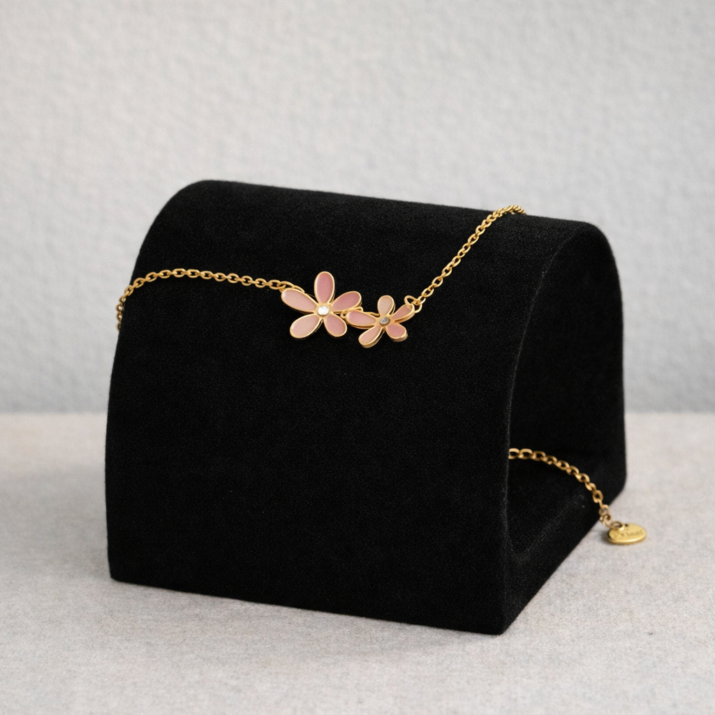 Bracelet chaîne dorée double fleurs roses
