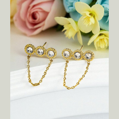 Boucles d'oreilles dorées triple strass avec chaîne