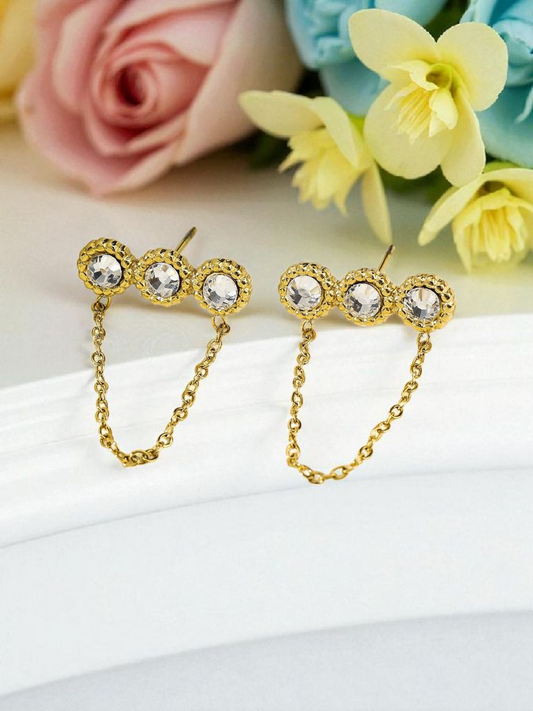 Boucles d'oreilles dorées triple strass avec chaîne
