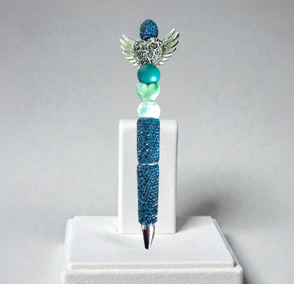 Stylo strass fait main cœur d'ange vert irisé et phosphorescent 🩵