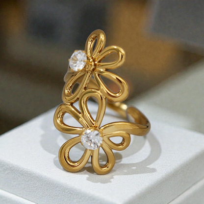 Bague ajustable ornement double fleurs à 5 pétales avec strass central