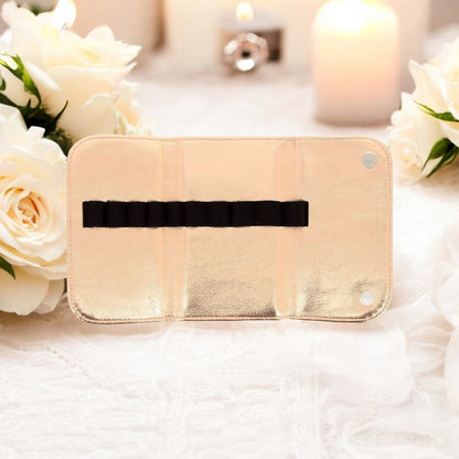 Pochette en simili-cuir or rose et 12 pinceaux à maquillage