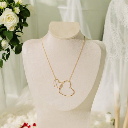 Collier double cœur entrelacés