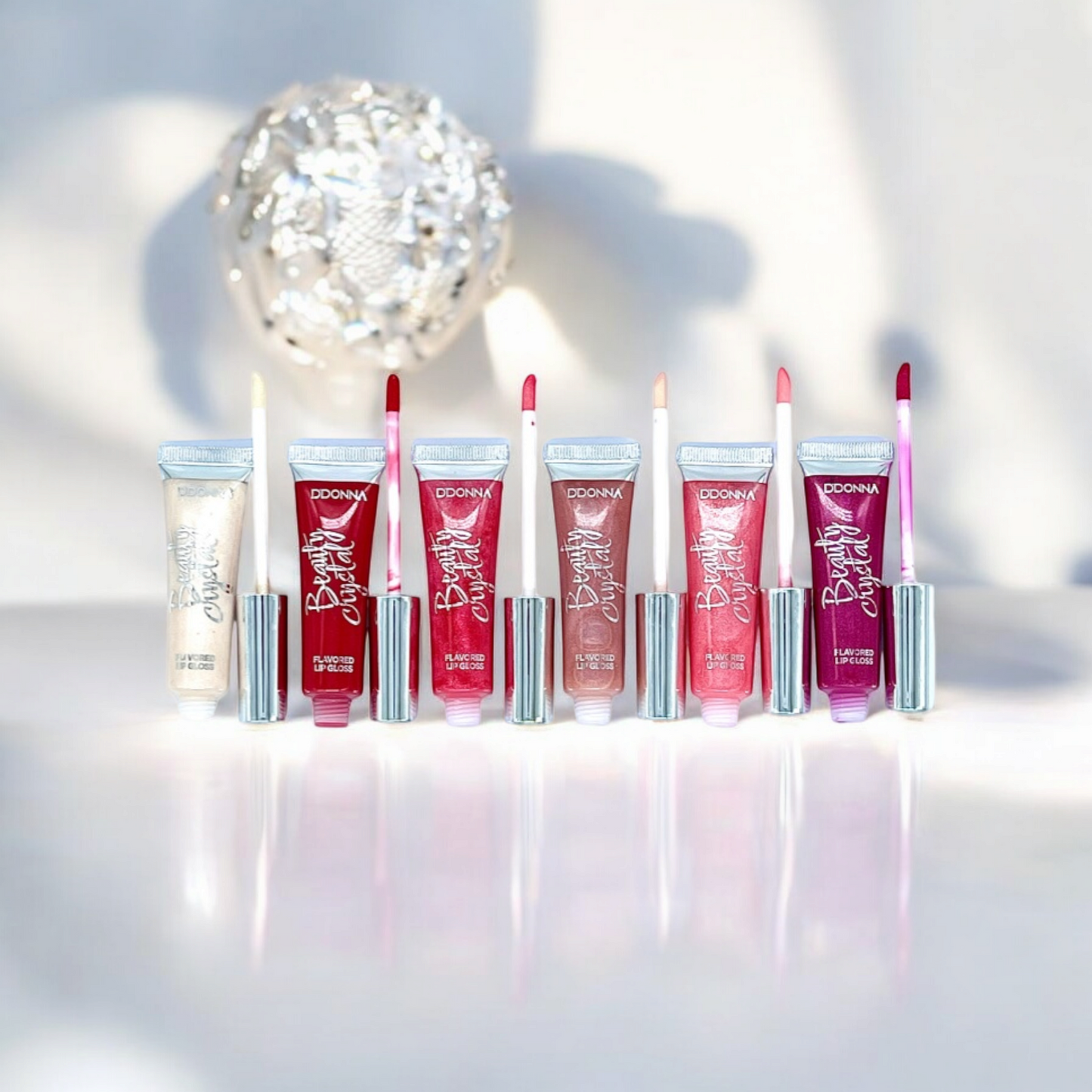 Gloss BEAUTY CRYSTAL, sensation soyeuse et couleur modulable.