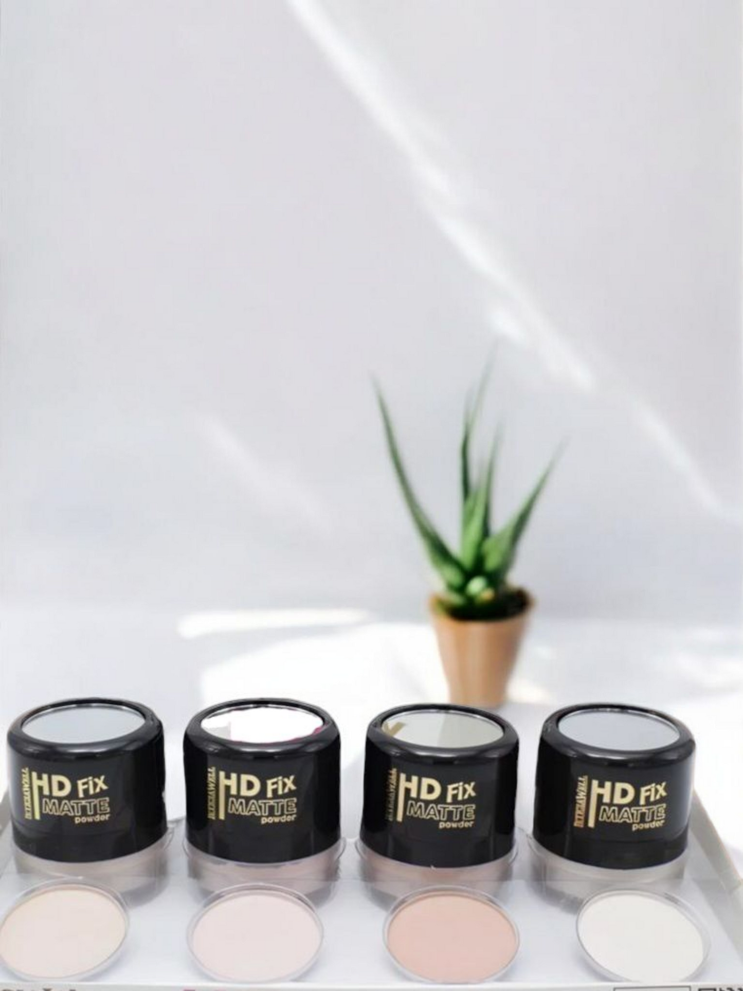 Poudre libre fixatrice et correctrice