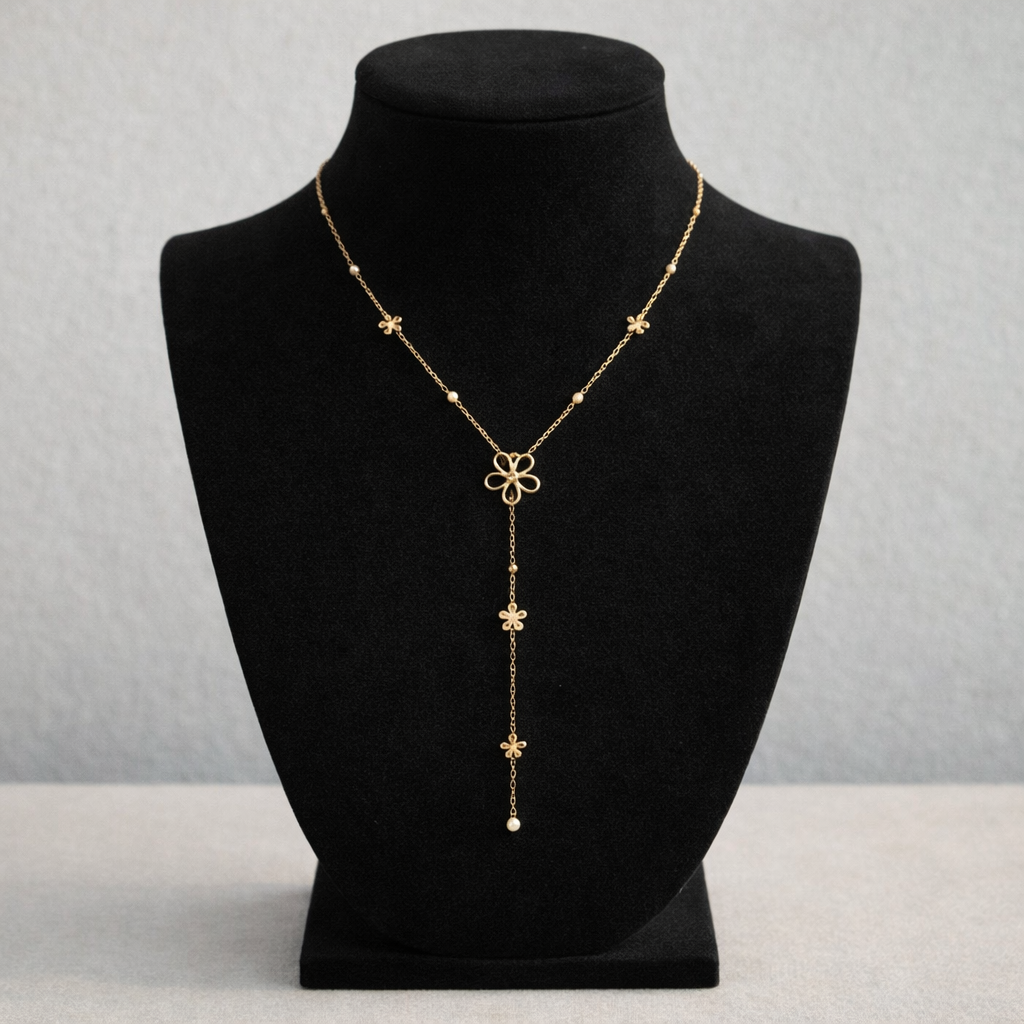 Collier doré en Y à fleurs ajourées et petites billes