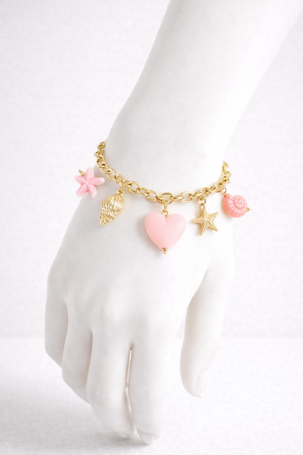 Bracelet doré breloques mer colorée rose