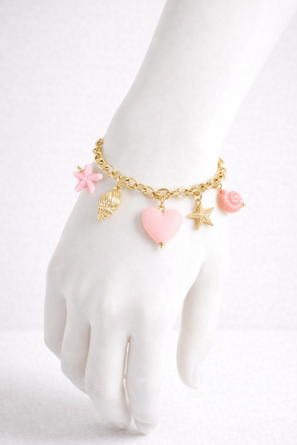 Bracelet doré breloques mer colorée rose