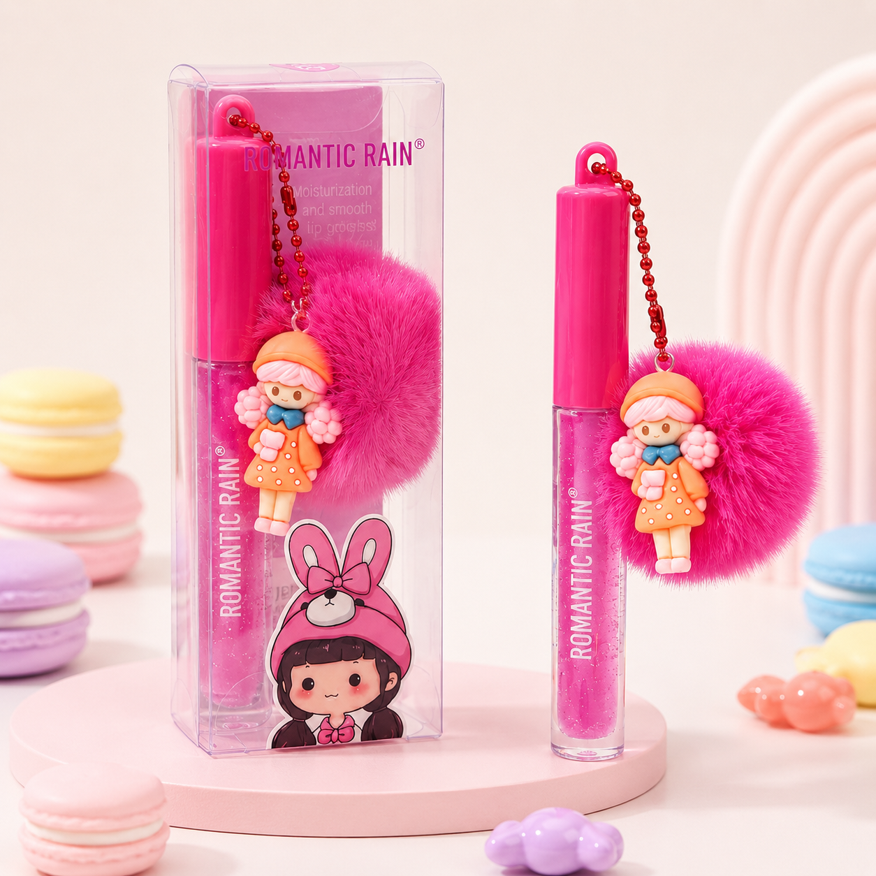 Gloss porte-clés pompon – Écrin de douceur