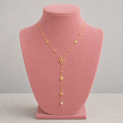Collier doré en Y à fleurs ajourées et petites billes